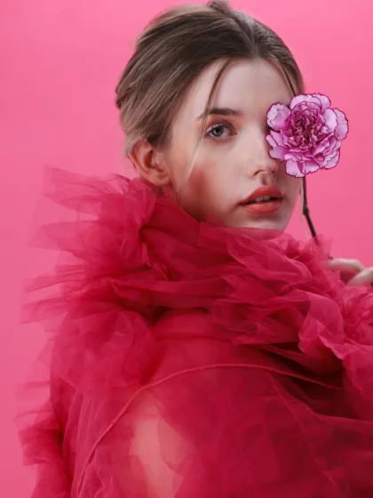 Live model fashion still, pink tulle dress portrait